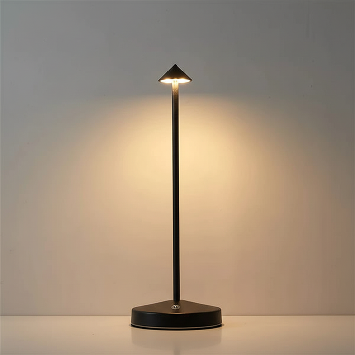 Cordless LED table lamp, perfect for modern home decor, offers flexible warm lighting.