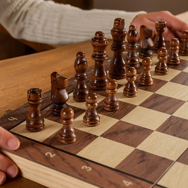 Foldable wooden magnetic chess set, portable for travel. Enjoy classic strategy board games anywhere.
