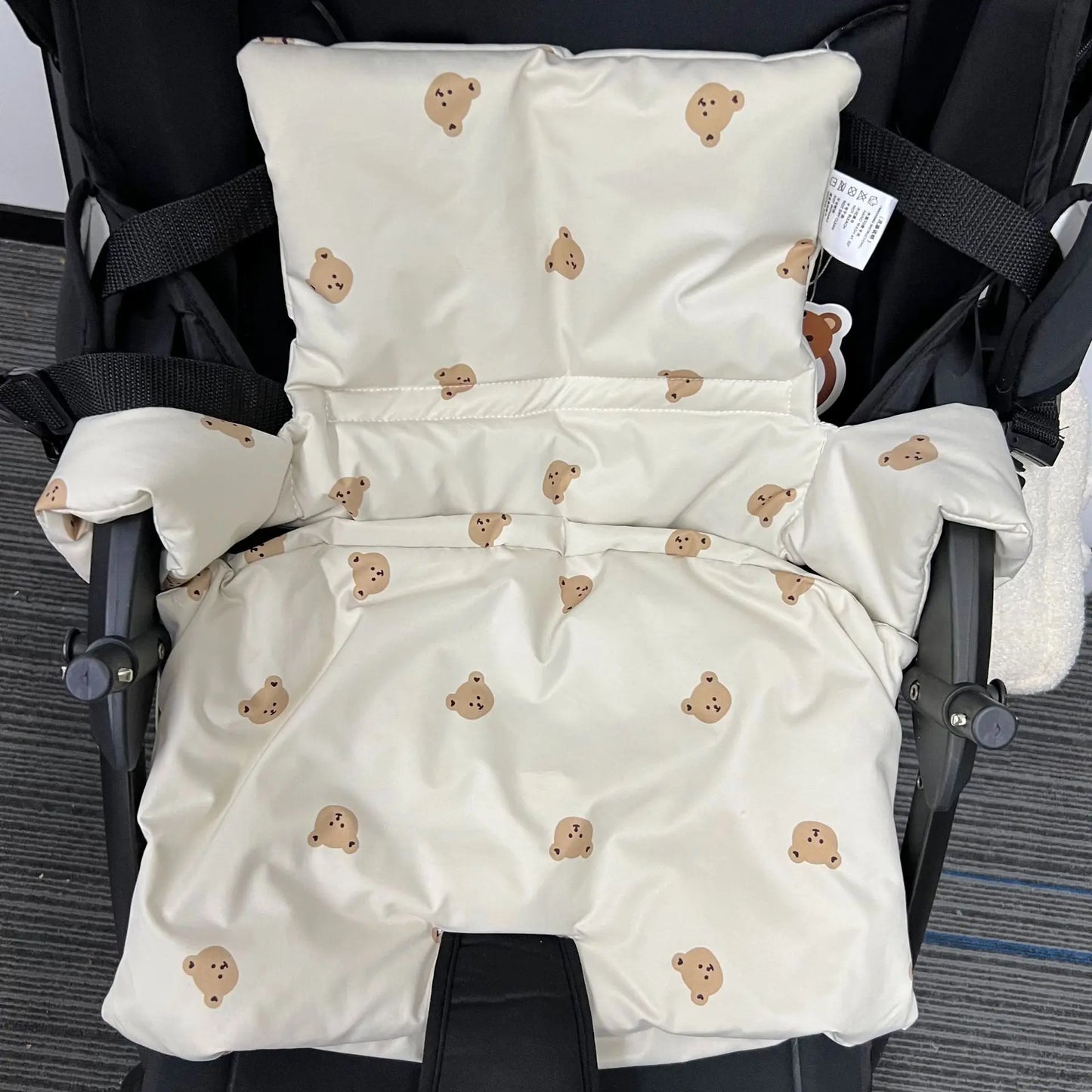 Ergonomic animal print baby chair cushion, designed as a stable non-slip booster for active toddlers.