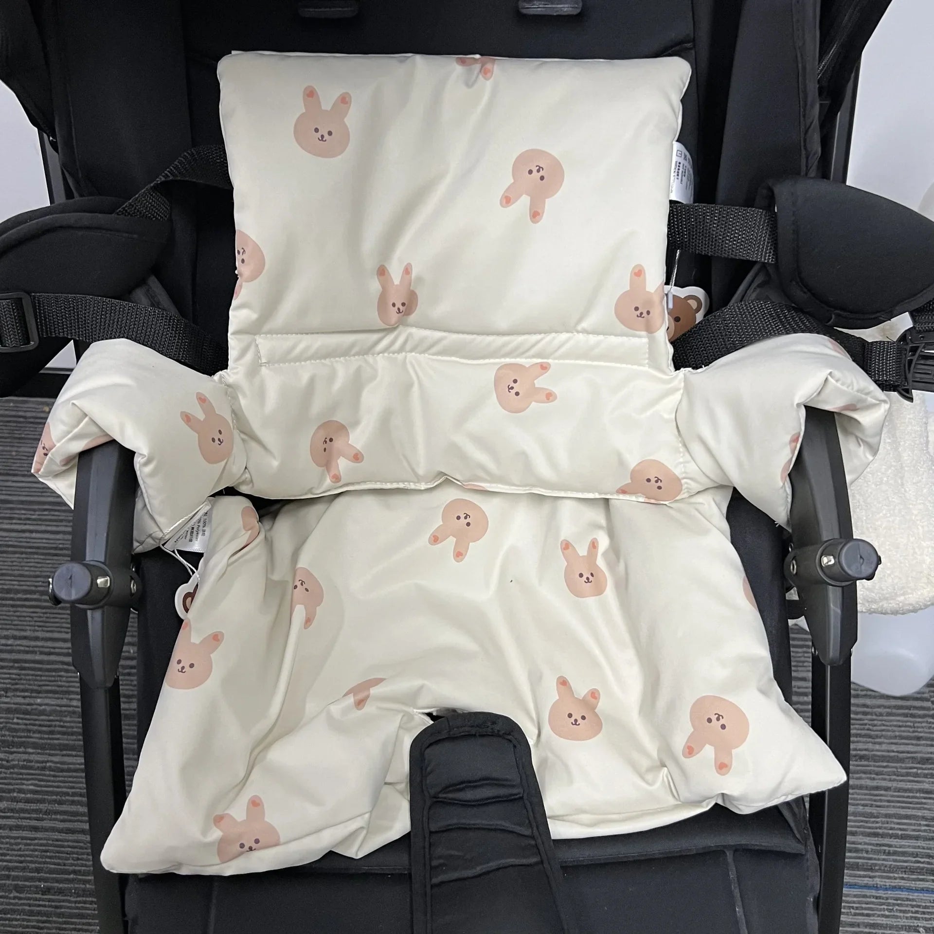Multi-functional infant dining support and non-slip booster seat, featuring a charming animal print.