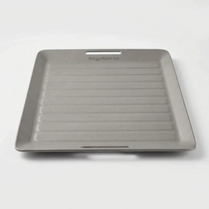 Lightweight ridged grill plate with BBQ tongs, perfect for solo camping, hiking, backpacking & outdoor cooking.