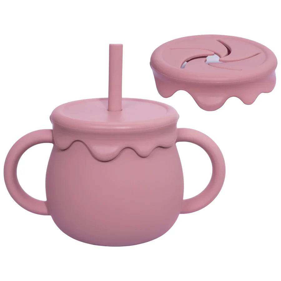 Ergonomic silicone food cup for babies, designed with an easy-grip handle for portable meals.