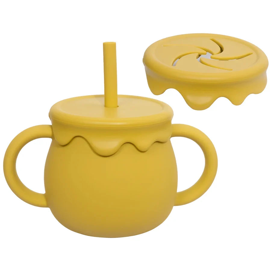 Soft silicone portable food cup with handle, a versatile mealtime solution for babies & toddlers.