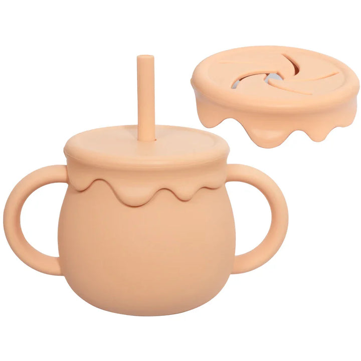 Durable silicone portable food cup with handle for easy baby feeding and toddler snack time.
