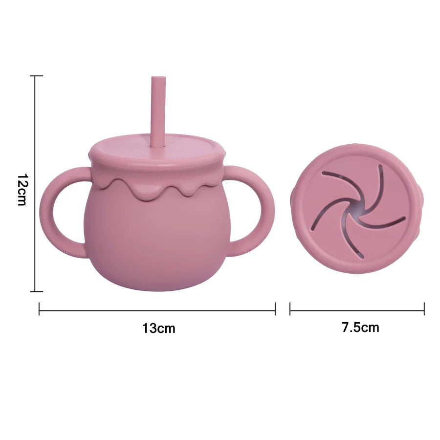 Compact silicone baby food cup with handle, ideal for travel & on-the-go infant feeding.