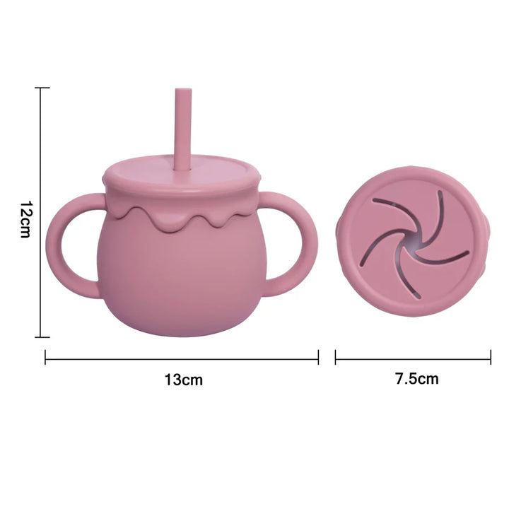 Compact silicone baby food cup with handle, ideal for travel & on-the-go infant feeding.