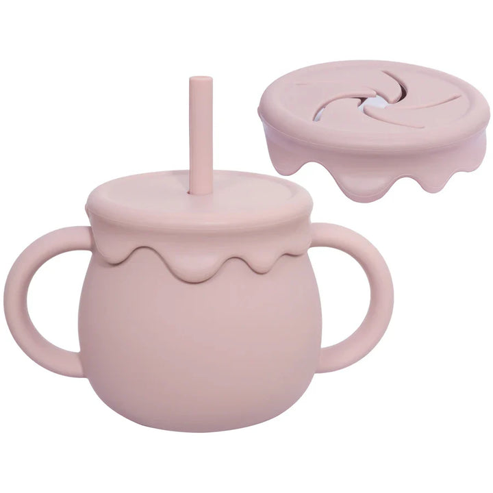 Baby's travel-friendly silicone food container with handle for convenient on-the-go feeding.