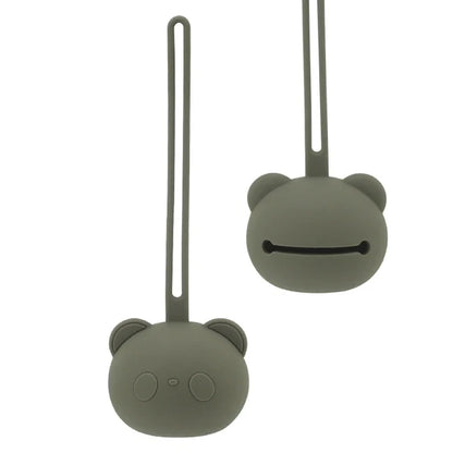 Yellow silicone pacifier holder, a practical baby travel accessory for keeping soothers clean