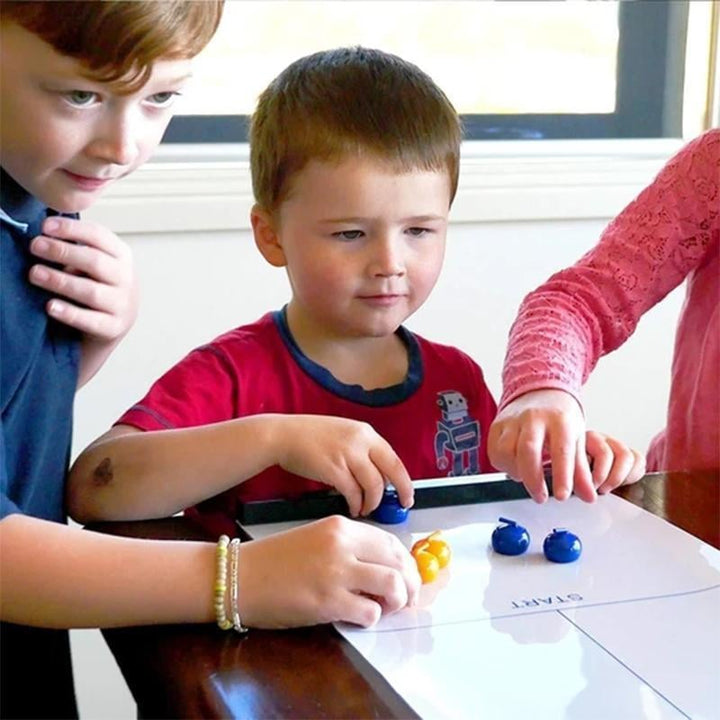 Portable Tabletop Curling Game for family fun. Compact board game with smooth playing surface & 8 curling stones.