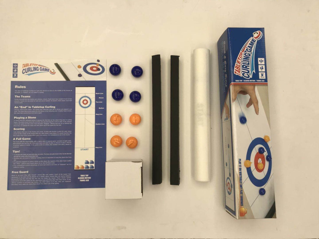 Curling stone gliding across the slick surface of the Portable Tabletop Curling Game during exciting indoor play.