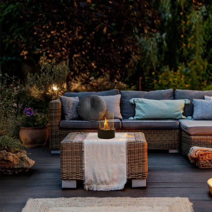 Sleek modern portable tabletop fire lantern, ideal for enhancing outdoor ambiance and garden decor with a warm flame.