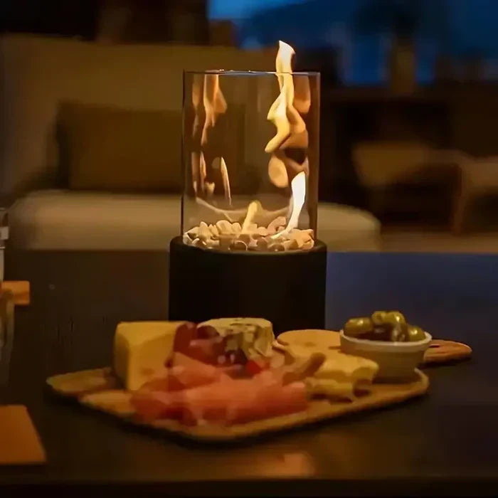 Outdoor tabletop fire pit lantern providing warm, inviting patio lighting and modern garden decor ambiance.