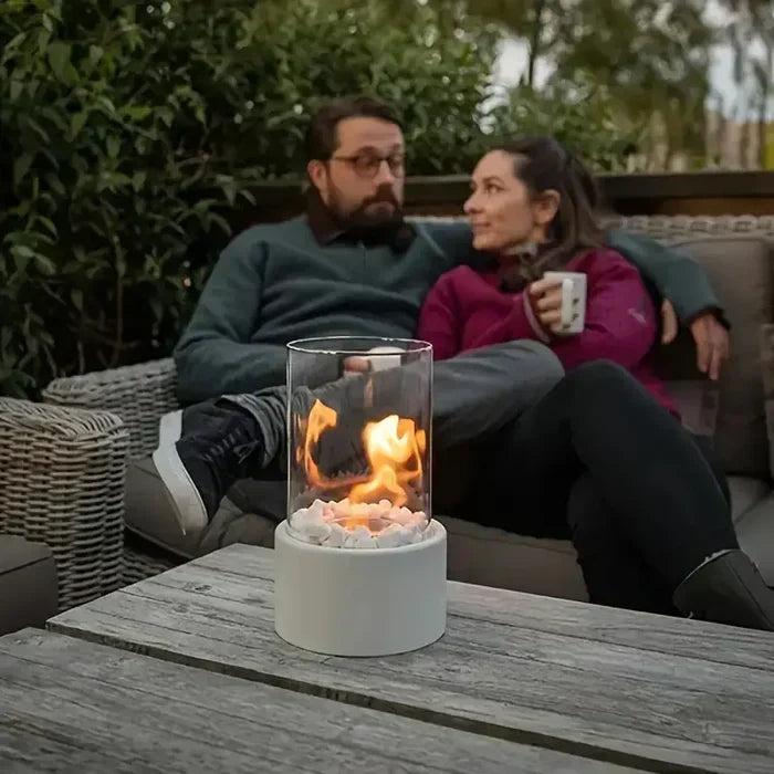 Versatile portable tabletop fire lantern, a modern decor piece for indoor ambiance or outdoor patio lighting.