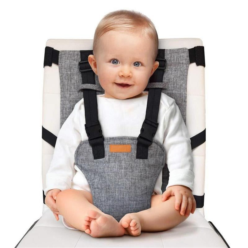 Portable travel high chair for infants & toddlers in a dining setting, highlighting its on-the-go convenience