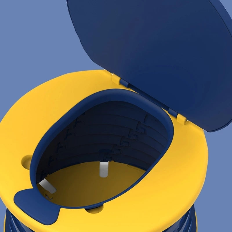 Portable toilet for kids, compact and sanitary, featuring a comfortable seat for training.