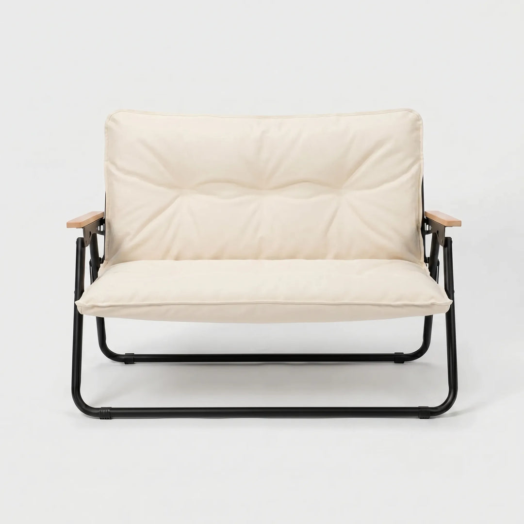 Compact folding camping sofa, easily portable for travel, offering durable outdoor seating for two.