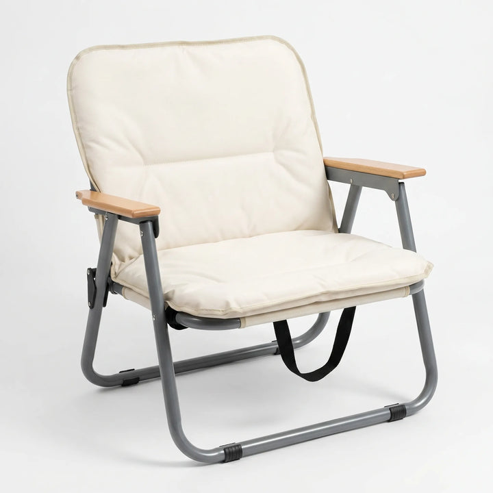 Two people relaxing on a sturdy, portable folding camping sofa, perfect for outdoor leisure and comfort.