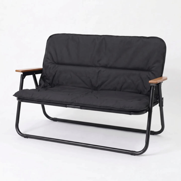 Spacious folding camp sofa for two, an essential piece of outdoor furniture for camping, beaches, or gardens.