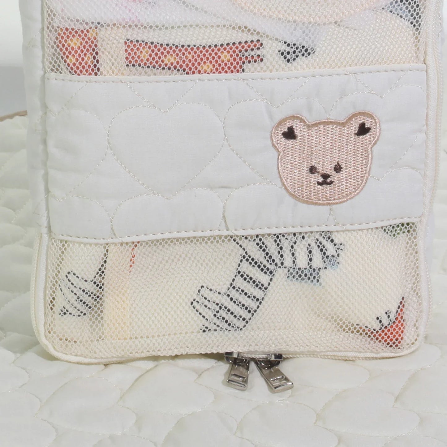 Stylish white bear diaper bag, a waterproof portable travel organizer for baby accessories & toiletries