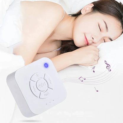 Baby peacefully sleeping with portable white noise sound machine in a neutral-themed nursery