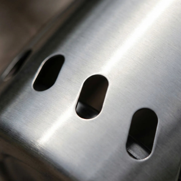 Efficient portable wood burning stove for outdoor adventures, ideal for backpacking and camping.