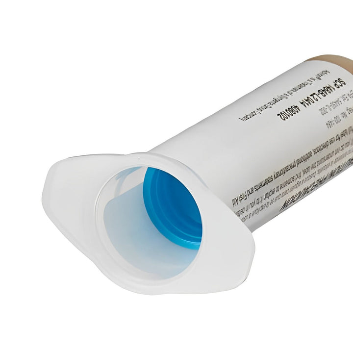 Close-up of clear indoxacarb gel bait emerging from syringe for precise cockroach extermination.