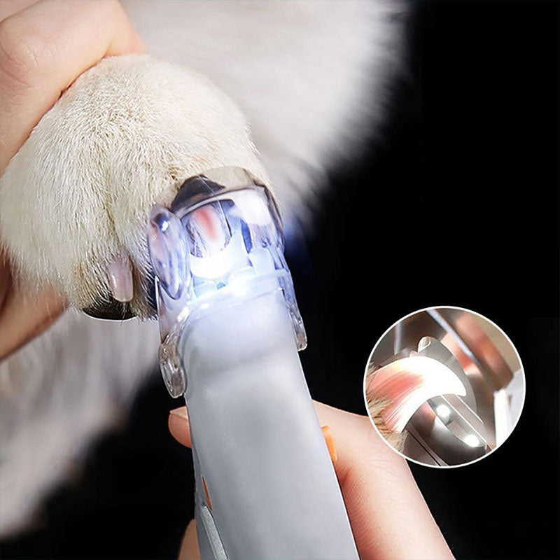 Easy trim dog nail clipper for home pet grooming, featuring bright LED light for precision & animal care.