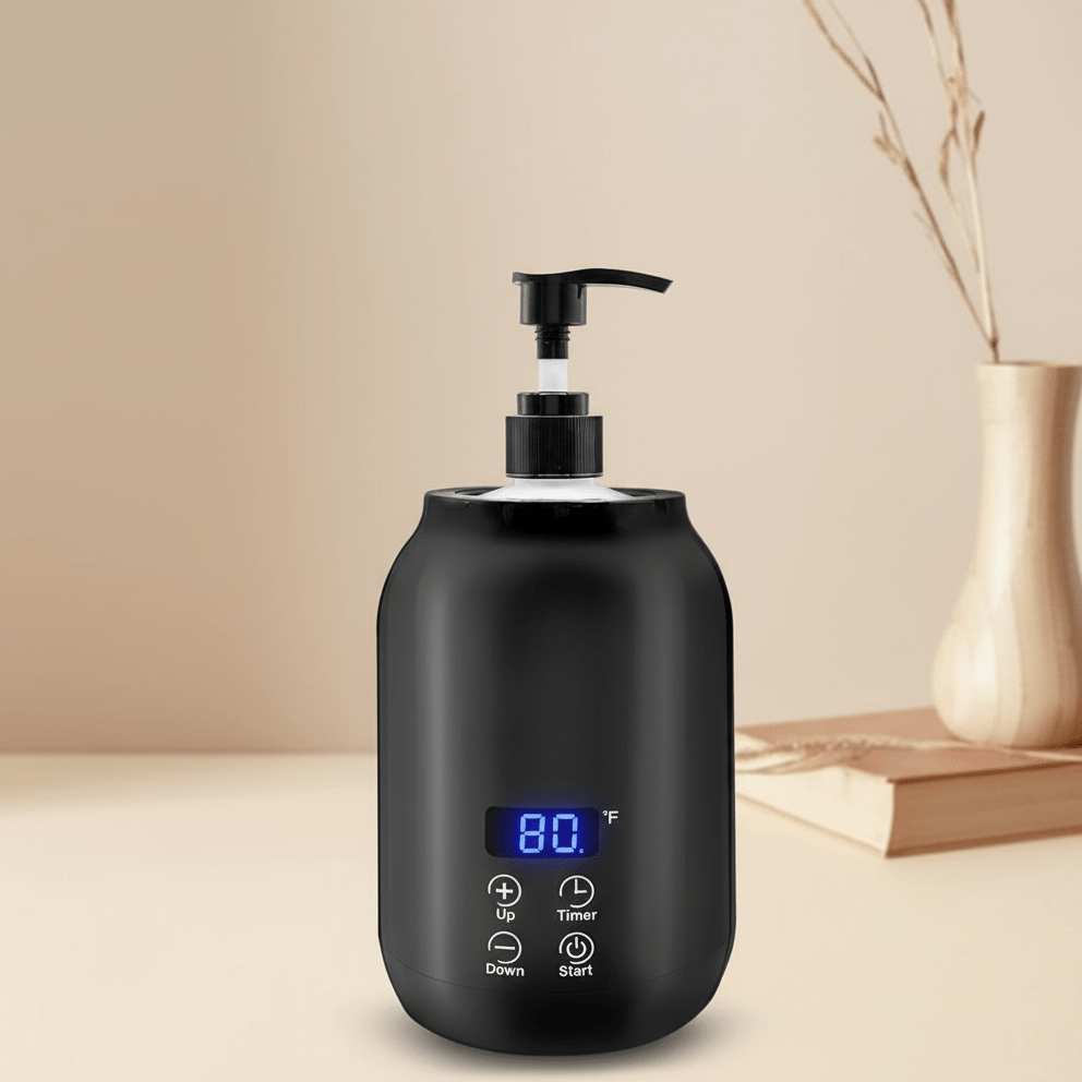 Close-up of professional electric oil warmer, showing heated massage oil ready for therapy & spa use.