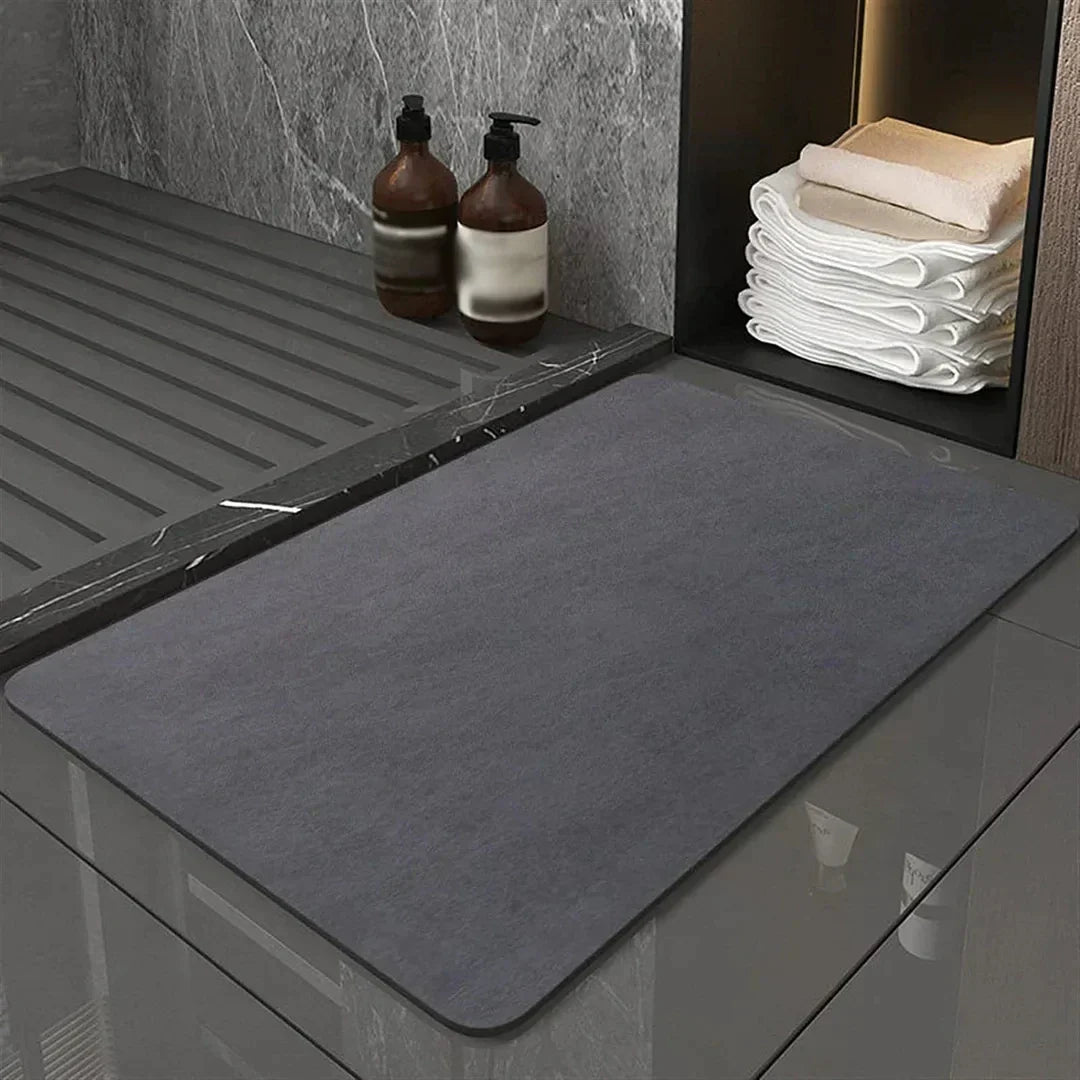 Quick dry anti-slip diatomite bath mat for bathroom floor. Highly absorbent and modern home decor.