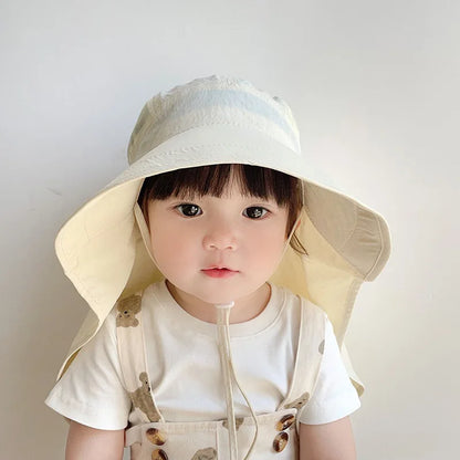 Children's quick-dry sun hat with playful cartoon characters, essential summer accessory