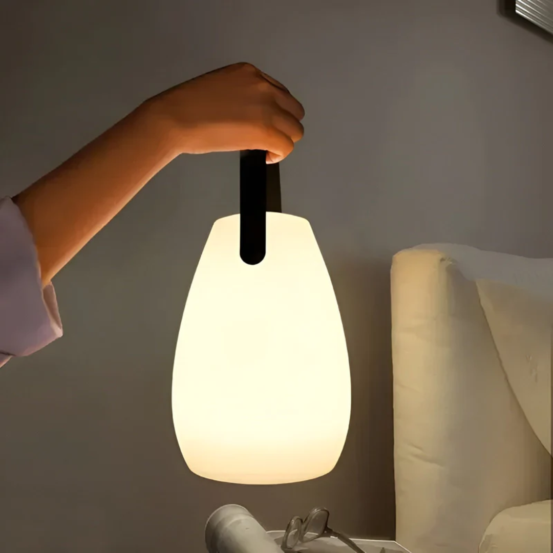 RadianceFlex portable waterproof wireless LED table lamp for indoor & outdoor ambiance.