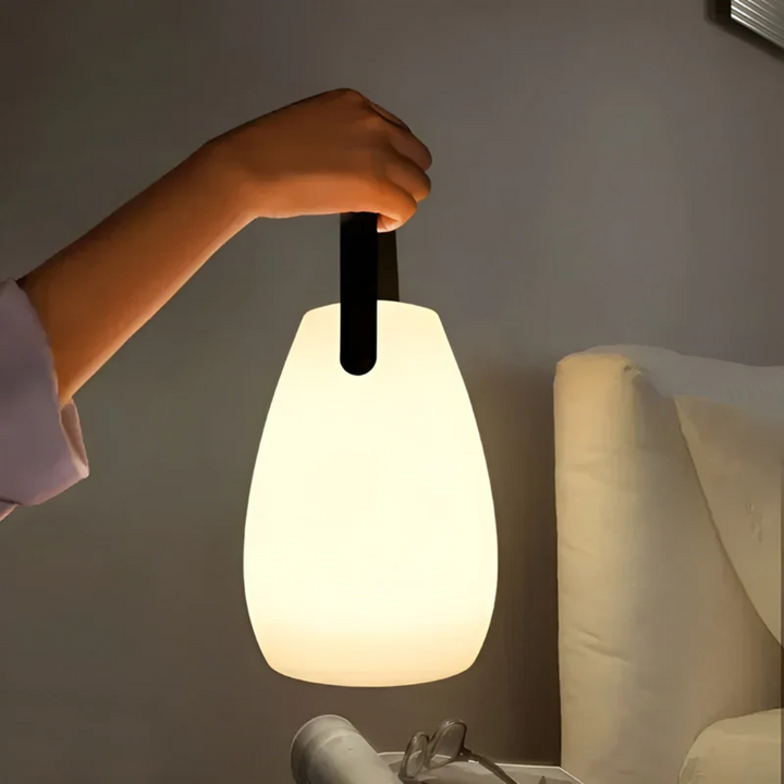 RadianceFlex portable waterproof wireless LED table lamp for indoor & outdoor ambiance.