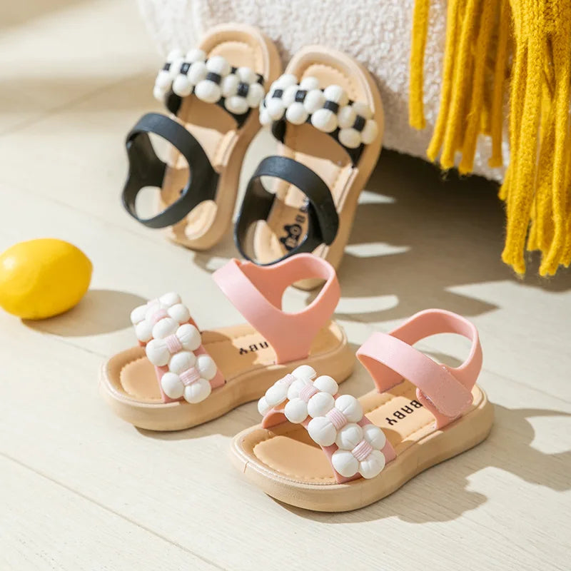 Grey anti-slip children's footwear, comfortable and breathable for summer adventures.