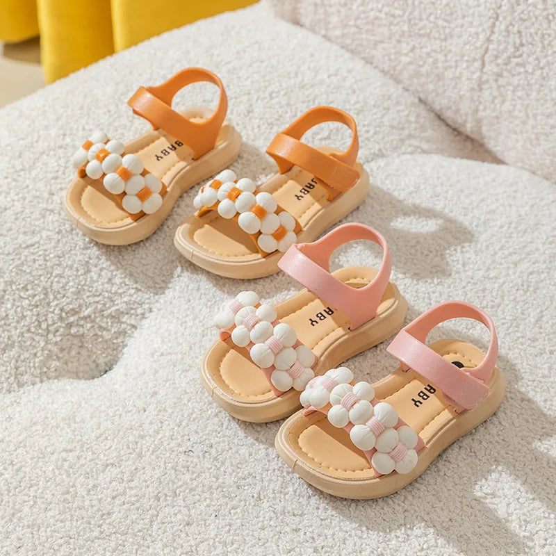 Pink breathable toddler sandals, anti-slip design for comfortable summer beach adventures.