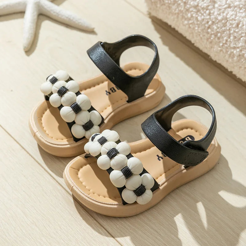 Green kids' sport sandals, anti-slip and quick dry for active summer outdoor play.
