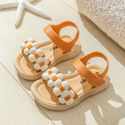 Yellow anti-slip beach sandals for children, perfect breathable summer footwear.