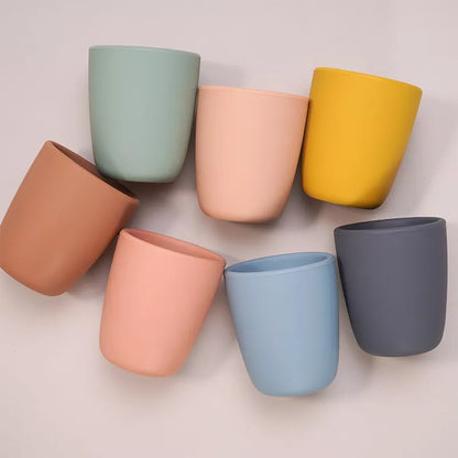 Red baby food-grade silicone snack cup, spill proof for toddlers, portable feeding solution