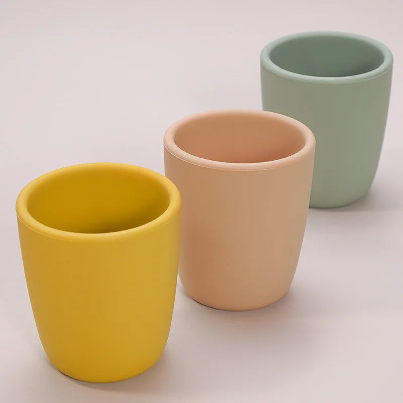 Ergonomic silicone baby snack cup, designed for small hands, spill proof
