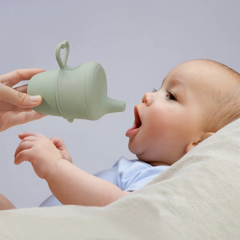 Green food-grade silicone snack cup, toddler feeding essential, portable and durable
