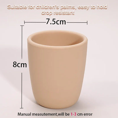 Orange portable baby snack cup, spill proof silicone, a must-have for infant feeding