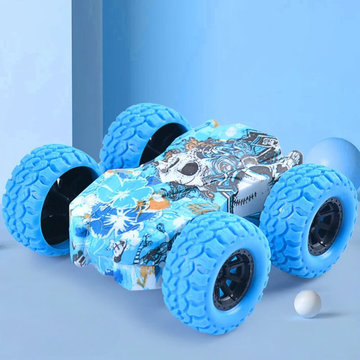 Overhead view of an inertia powered double-sided stunt car, a fun and durable children's vehicle