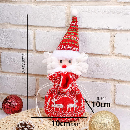 Stack of folded reusable Christmas drawstring bags, ready for festive holiday gift packaging