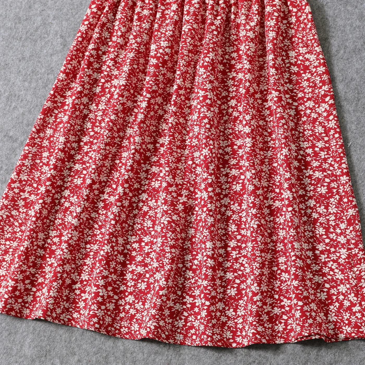 Women's casual red floral off-shoulder knee-length shirred dress for warm weather