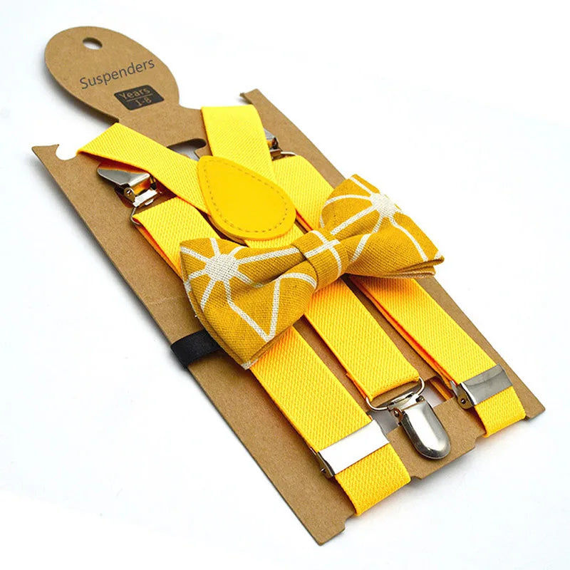 Close-up of kids' adjustable suspenders clasp and bow tie detail, quality baby accessories
