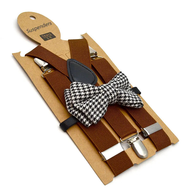 Unisex kids' adjustable bow tie & suspenders set folded neatly, ready for party wear