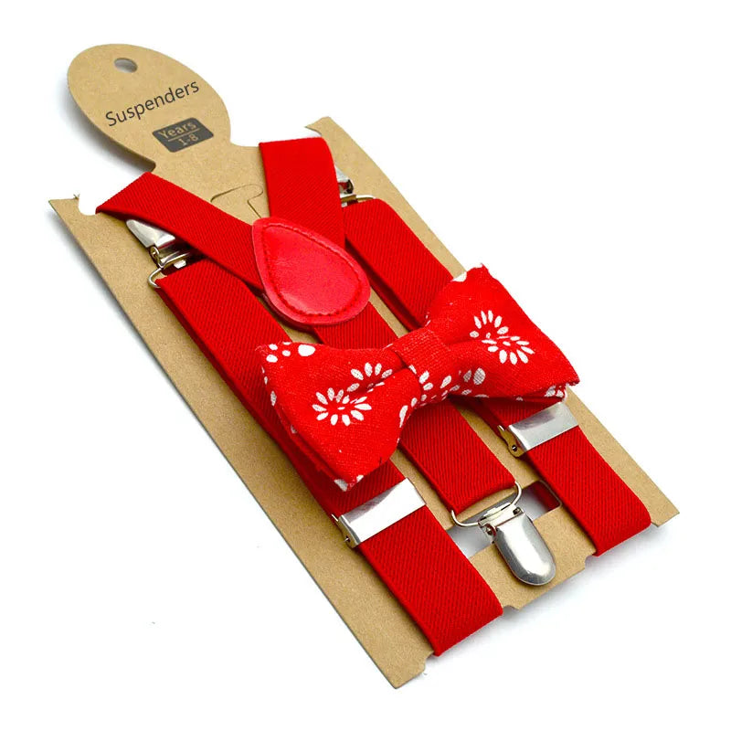 White elegant kids' bow tie & suspenders set, perfect for church or wedding outfits for children