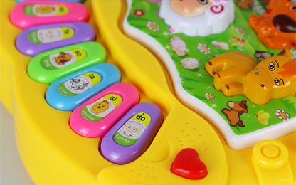 Children's gift: Red and yellow animal sound musical keyboard for kids.