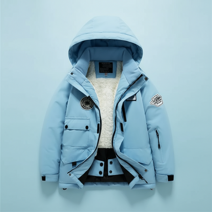 Detail of zip and pocket on green kids' waterproof fleece-lined thermal ski suit