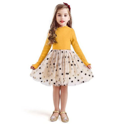 Yellow girls' long sleeve party dress with star mesh overlay, ideal for kids' fashion.