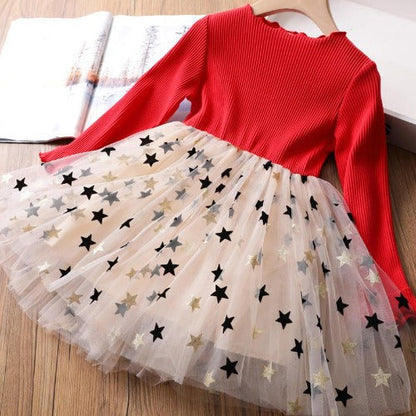 Elegant girls' long sleeve star print mesh dress, a stylish holiday outfit.